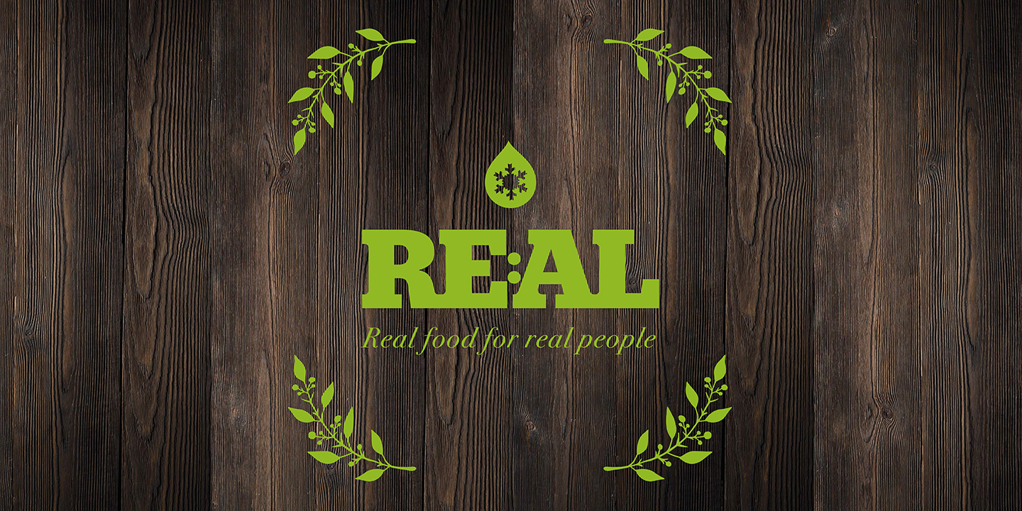 Logotyp av restaurangen REAL.